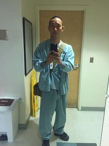 Jiu-Jitsu coach David Yu in his scrubs at work