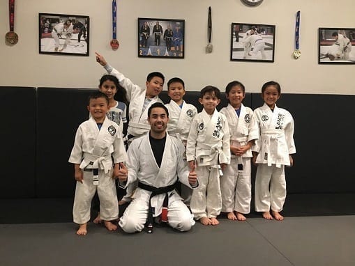 Professor Gino after belt promotions with the BJJ Jiu-Jitsu kids program.