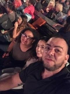 Jiu-Jitsu Adult student Ismael Aguila with his daughter and girlfriend at a concert