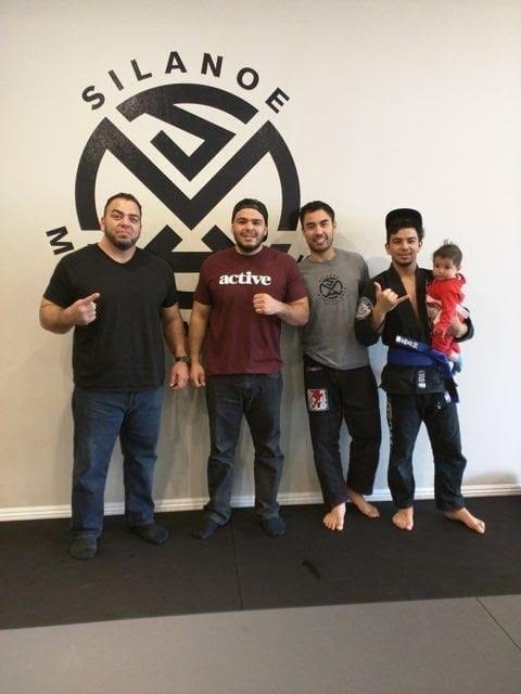 A group picture of Jacob and his family and team mates at the world championships in Long Beach of the SJJIF Jiu-Jitsu Sport Federation 