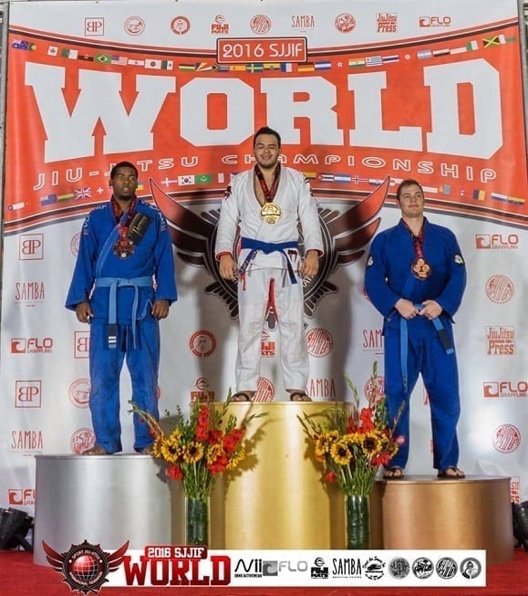 Jacob Aguila Silanoe Martial Arts Student of the Month taking first at the SJJIF World Championships on the podium at the Blue Belt Adult Division