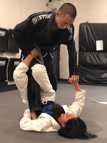 Nikki from Rosemead training BJJ with coach David Yu at Silanoe